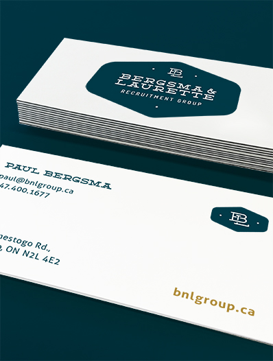 white business cards on teal background